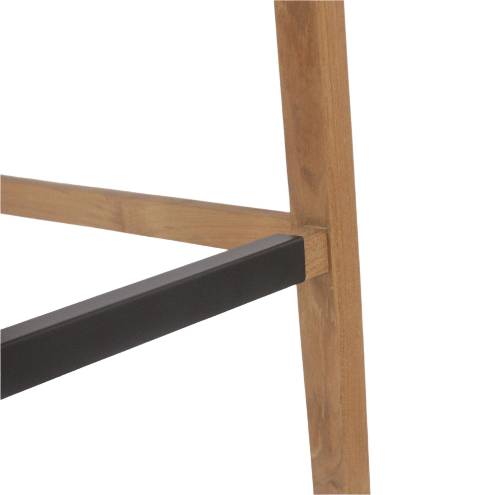 Close-up of a teak outdoor bar stool leg with a black metal footrest inserted into the wooden joint, showing natural teak grain and the contrasting matte black support.