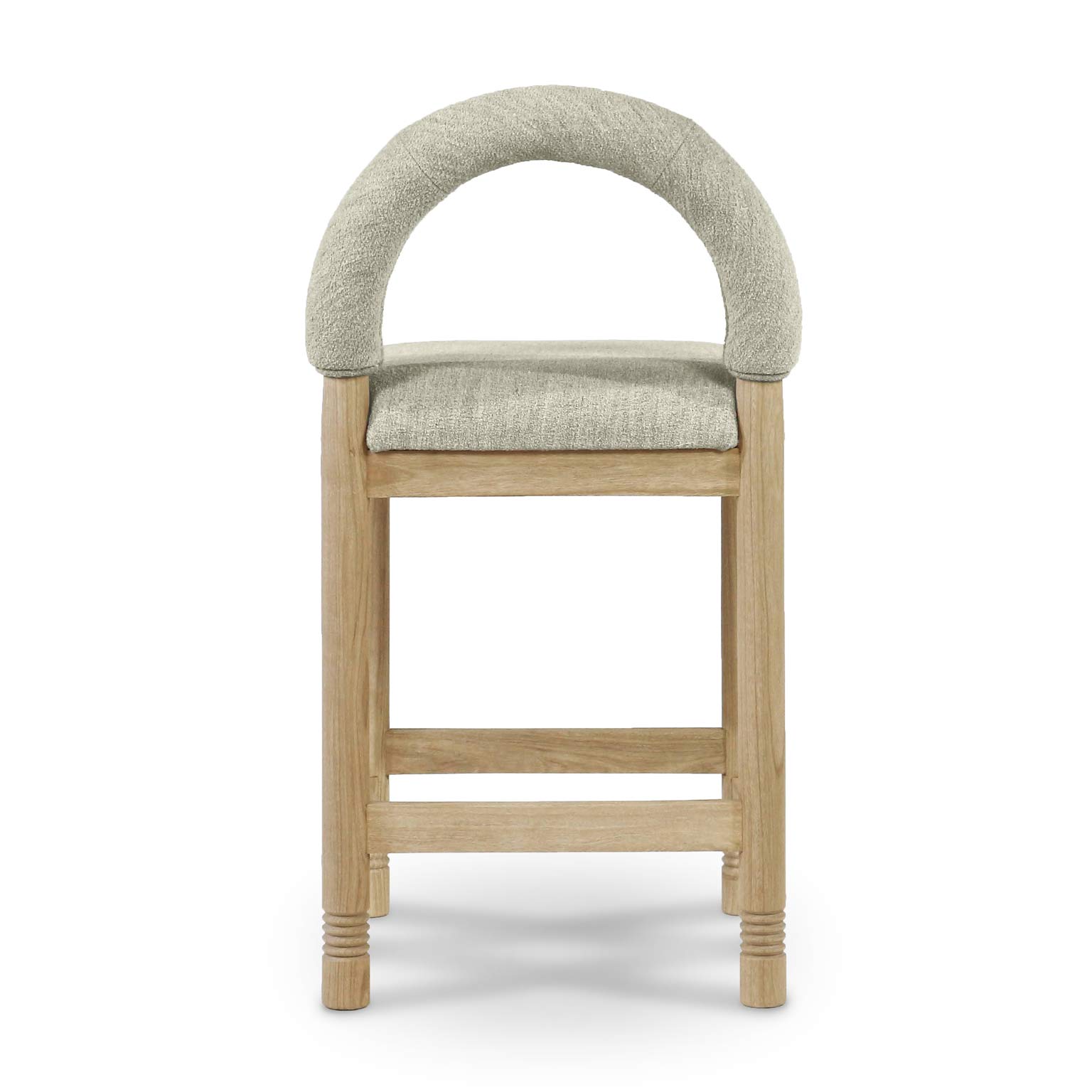 Front view of a counter stool with a rounded arched back upholstered in beige boucle fabric and a padded seat, supported by natural oak legs with a wooden footrest and subtle turned leg details.
