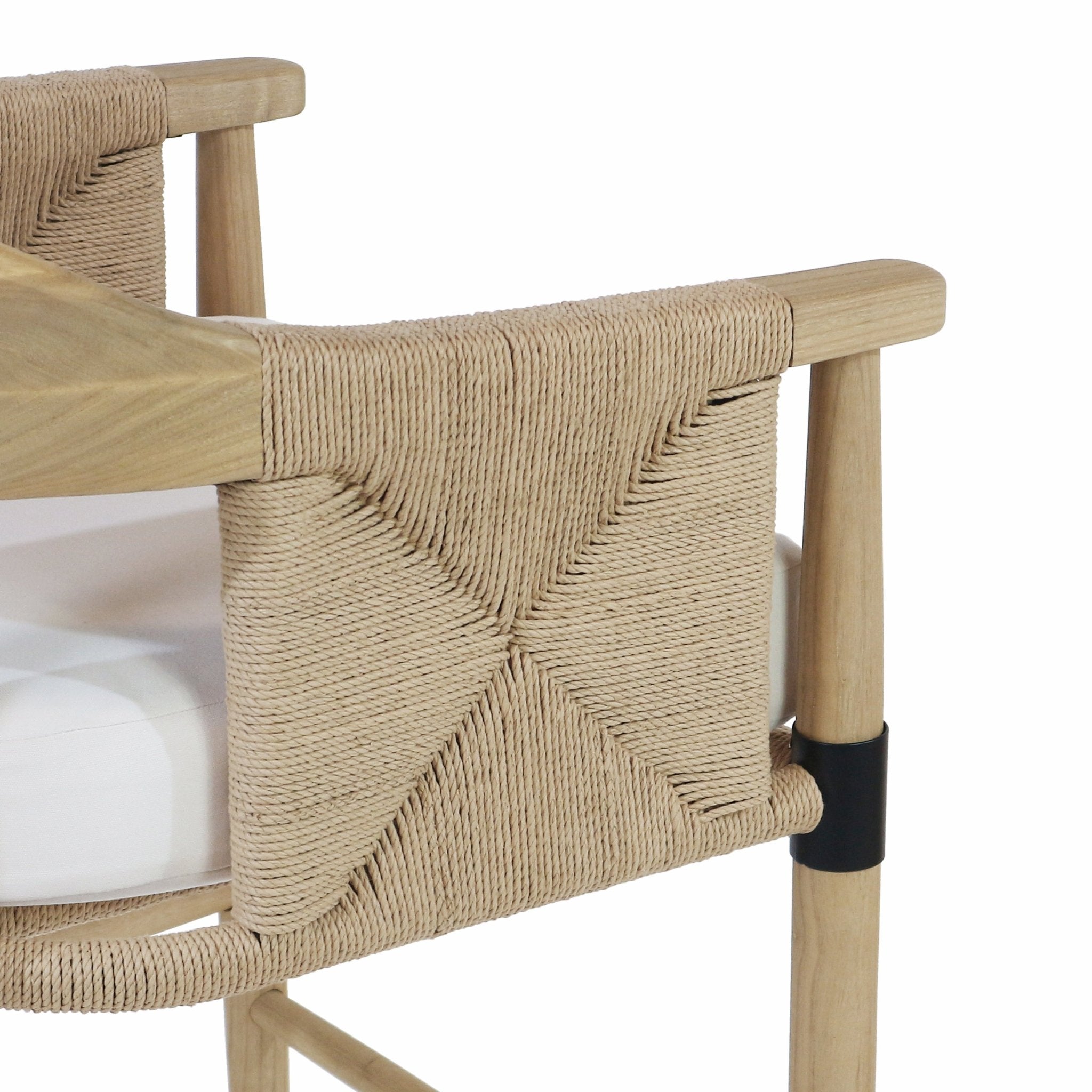 Close-up of a natural wood counter stool showing a tightly woven beige rope back in an X pattern, rounded natural wood frame, white cushioned seat and a black metal leg collar.