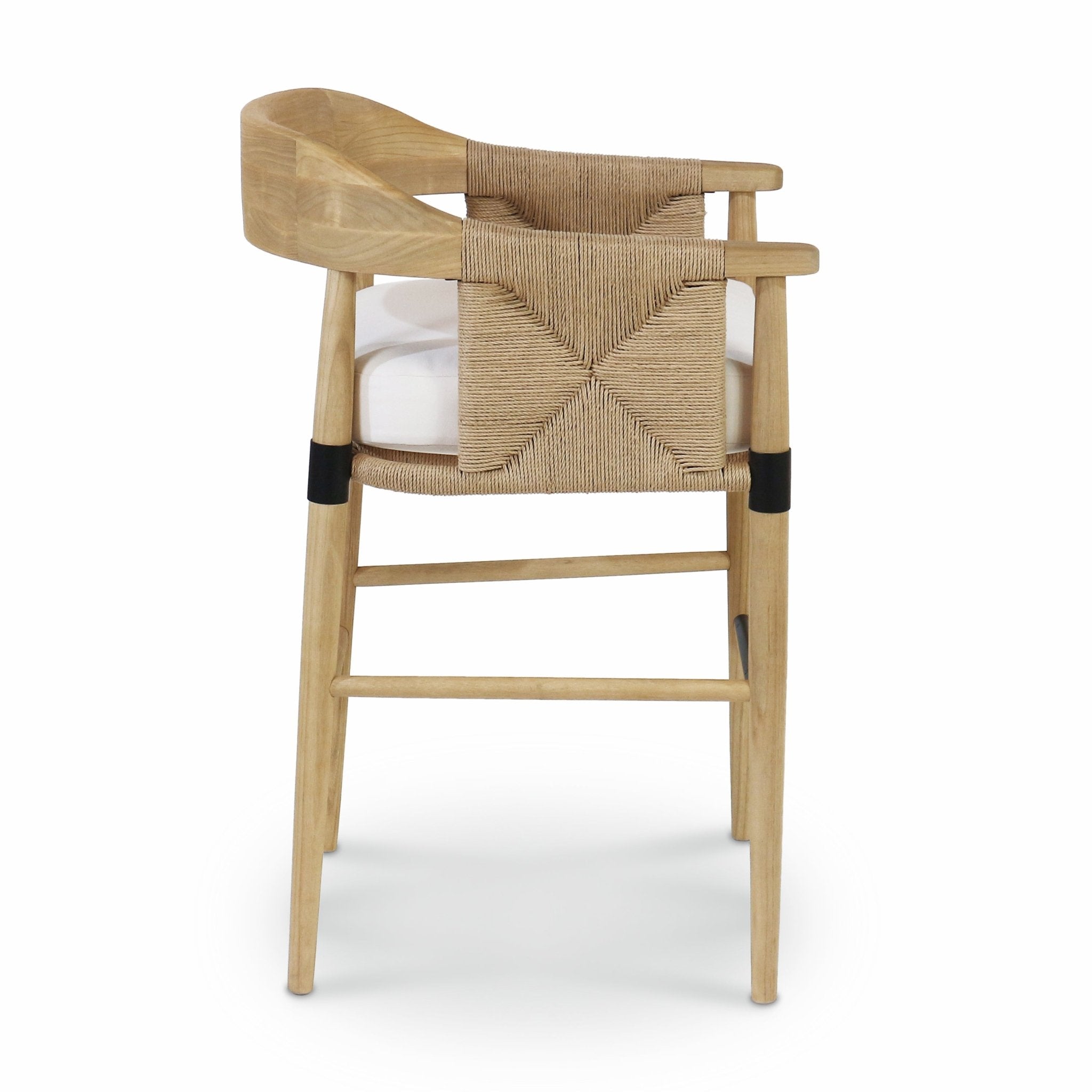 Front view of a natural wood counter stool with woven rope back, white fabric seat cushion, curved wooden armrest and rounded legs featuring black metal accent bands.