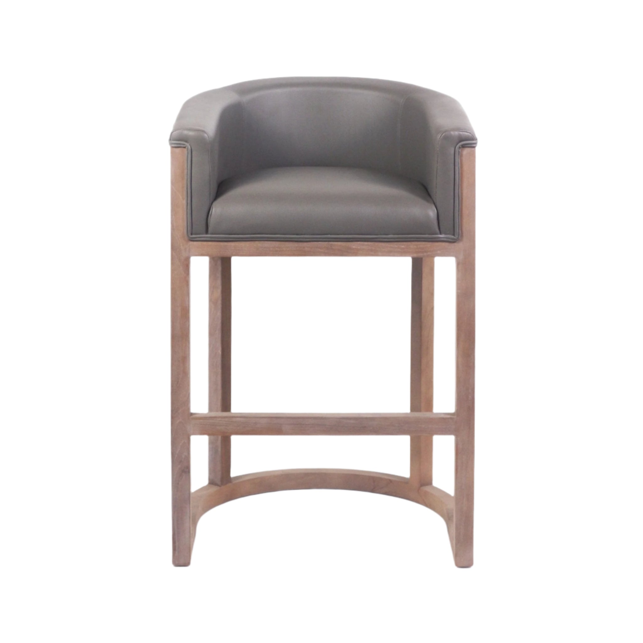 Front view of a mid-century modern teak wood bar stool with a curved taupe faux-leather upholstered seat, low arms, rectangular legs and an arched footrest stretcher.