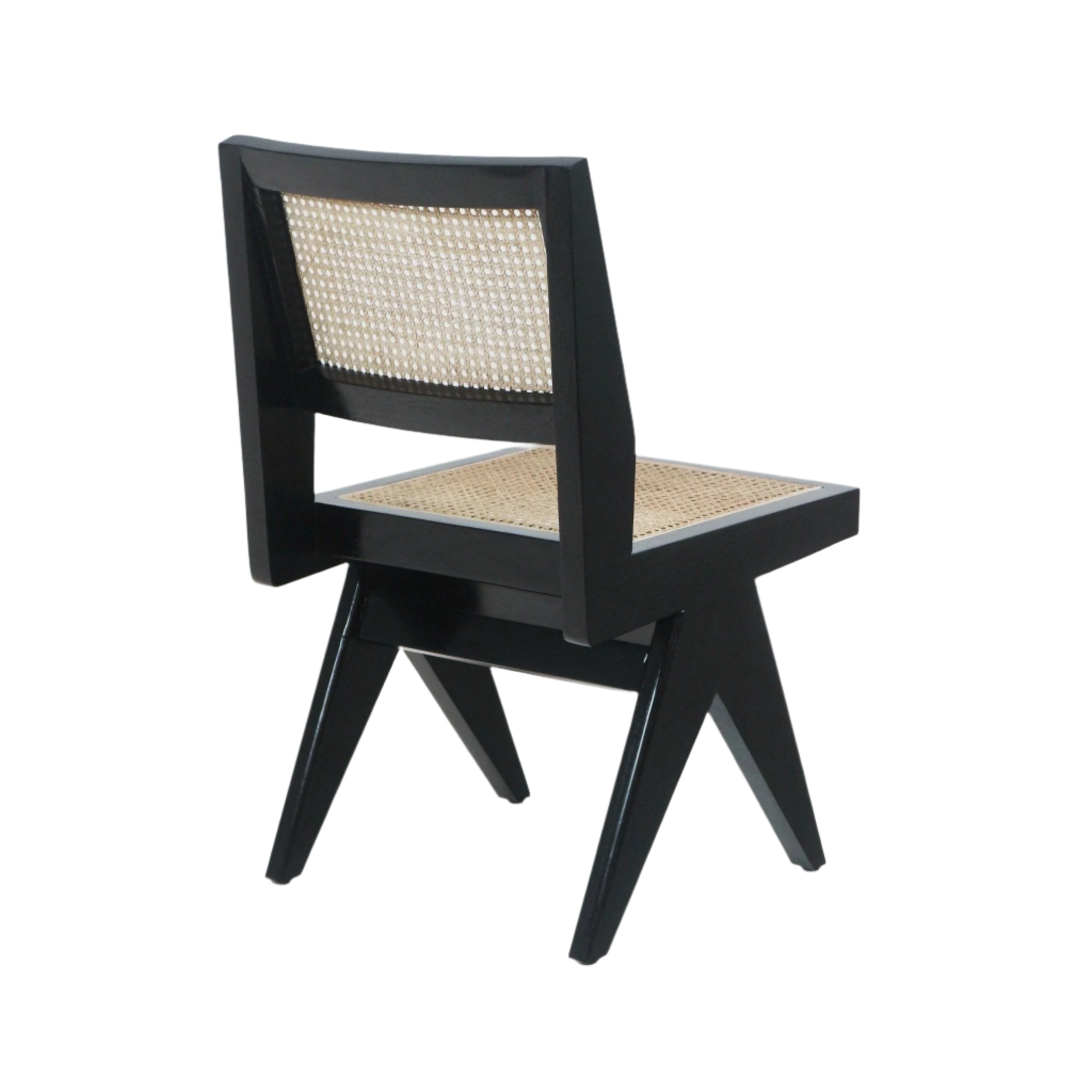 Armless side chair with a black solid wood frame and natural Vienna-weave cane seat and back, featuring angular mid-century modern legs and a low rectangular backrest on a white background.