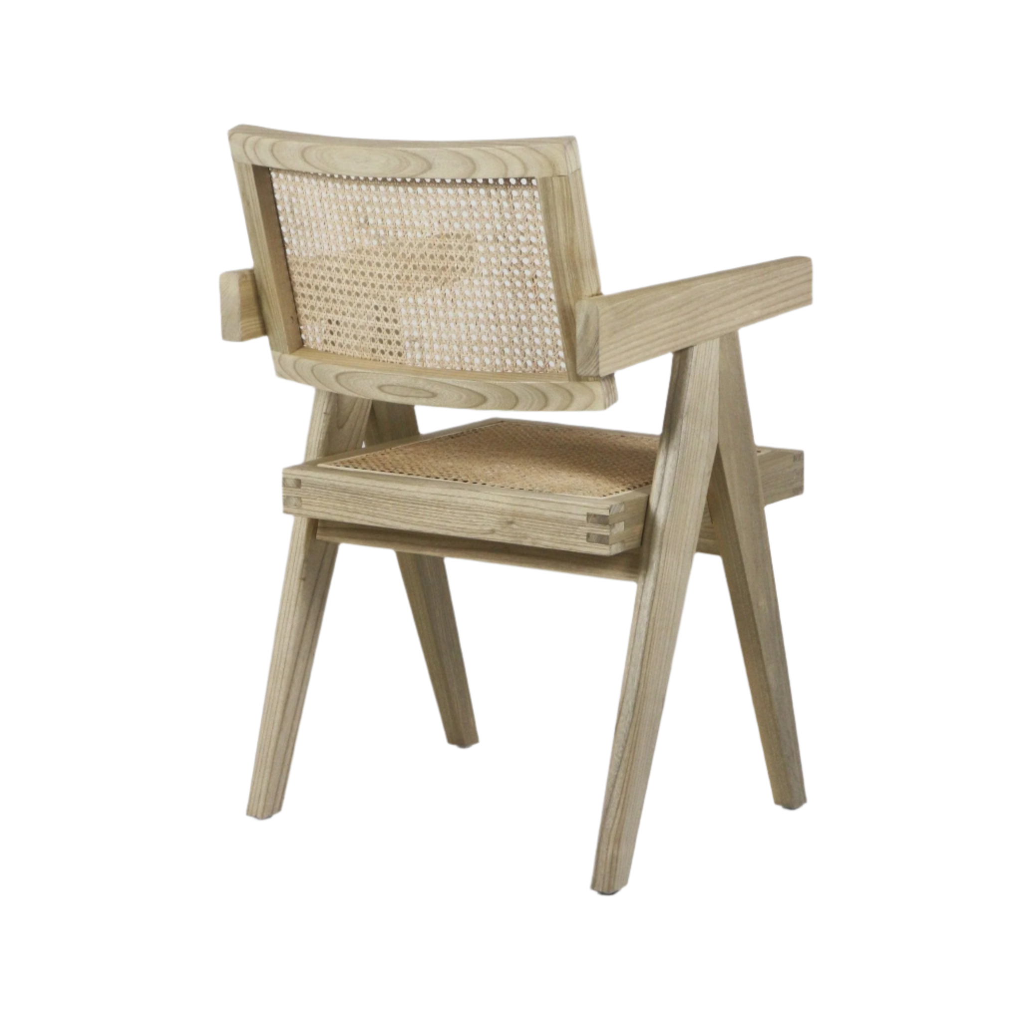 Light natural teak wood dining chair with woven cane back and seat, angled A-frame legs and rectangular armrests in a mid-century modern silhouette.