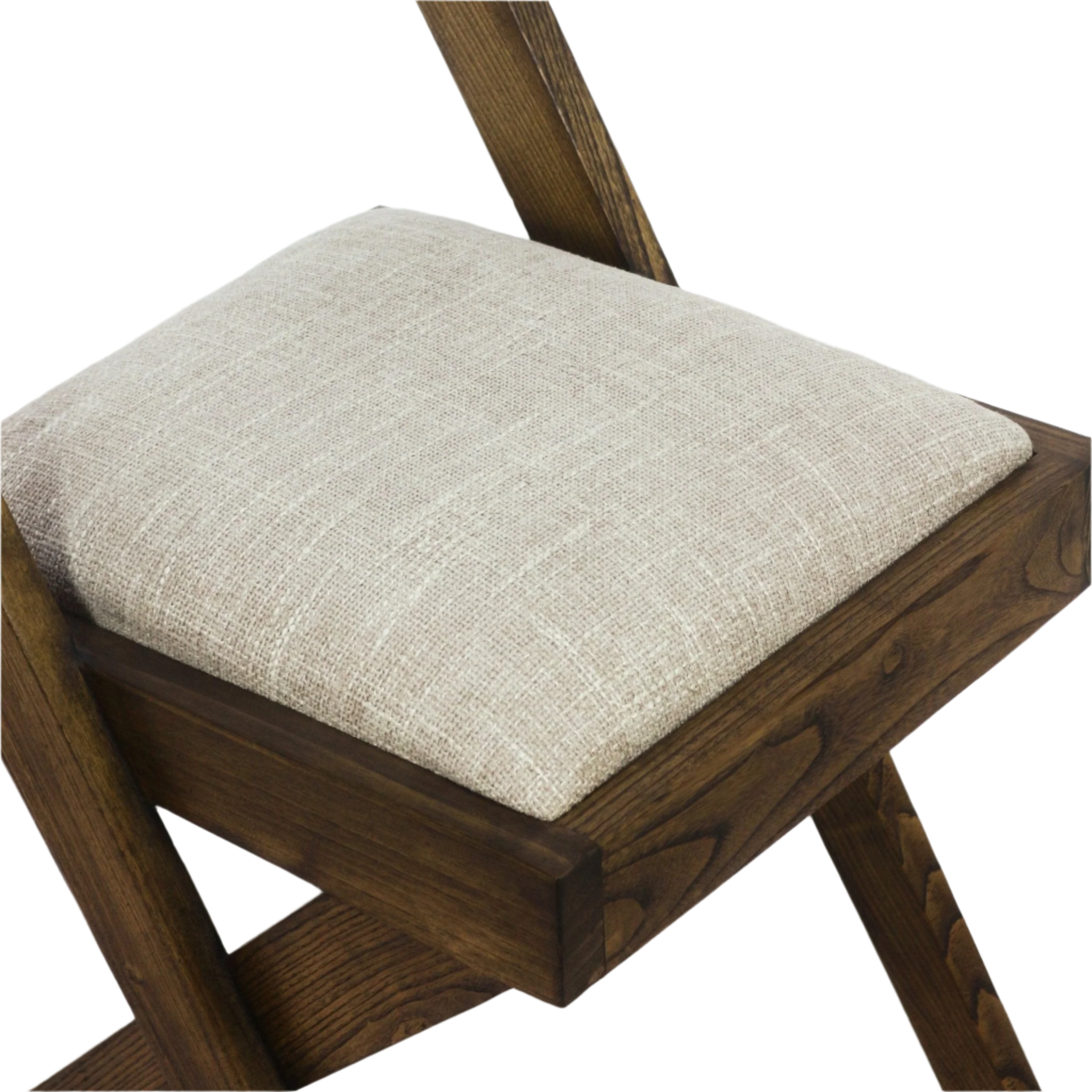 Close-up of a beige fabric upholstered seat cushion on a warm natural wood frame, showing angled mid-century modern legs and visible wood grain.