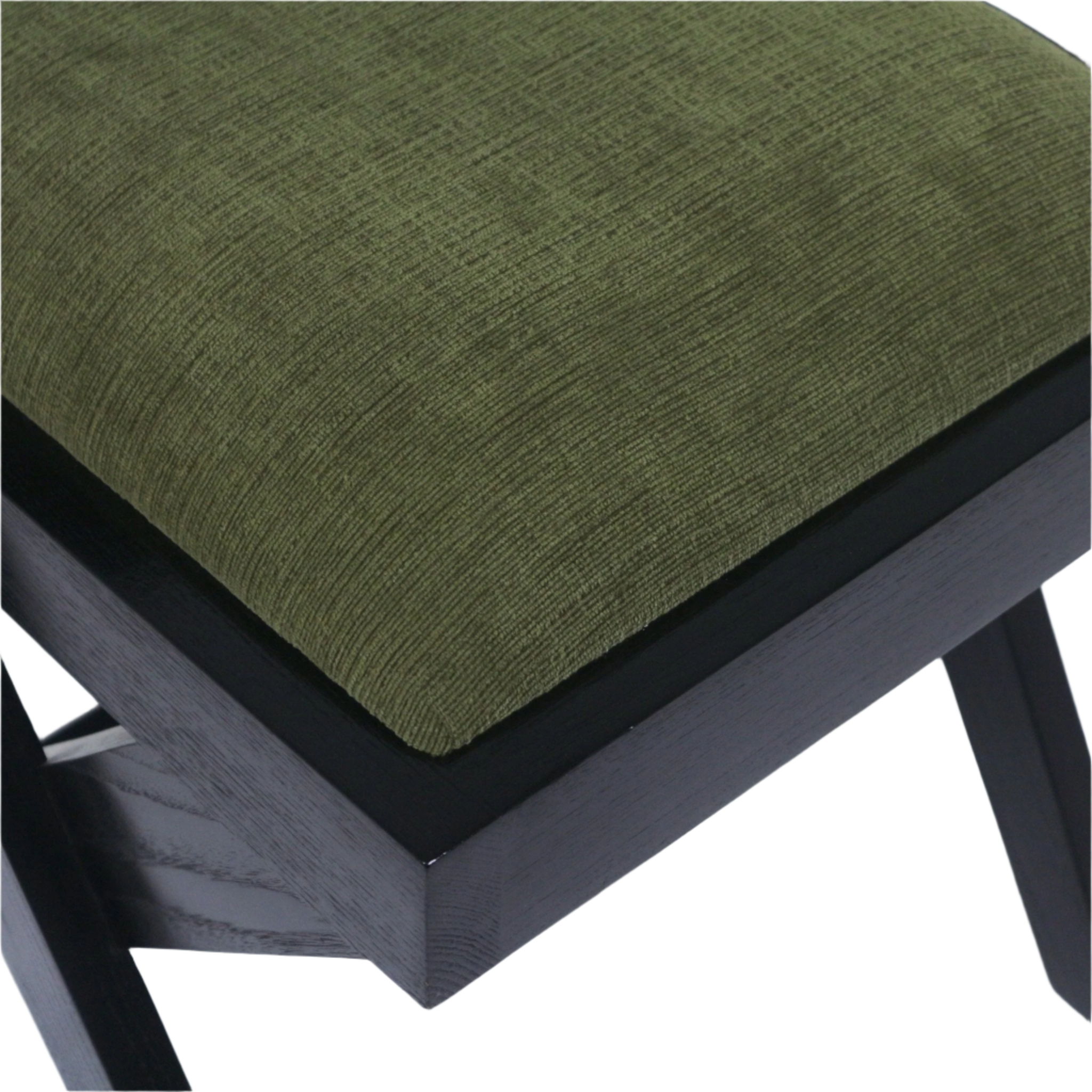 Close-up of a green chenille upholstered seat cushion on a black semi-gloss natural wood chair frame, showing textured fabric and visible wood grain on the frame and leg.