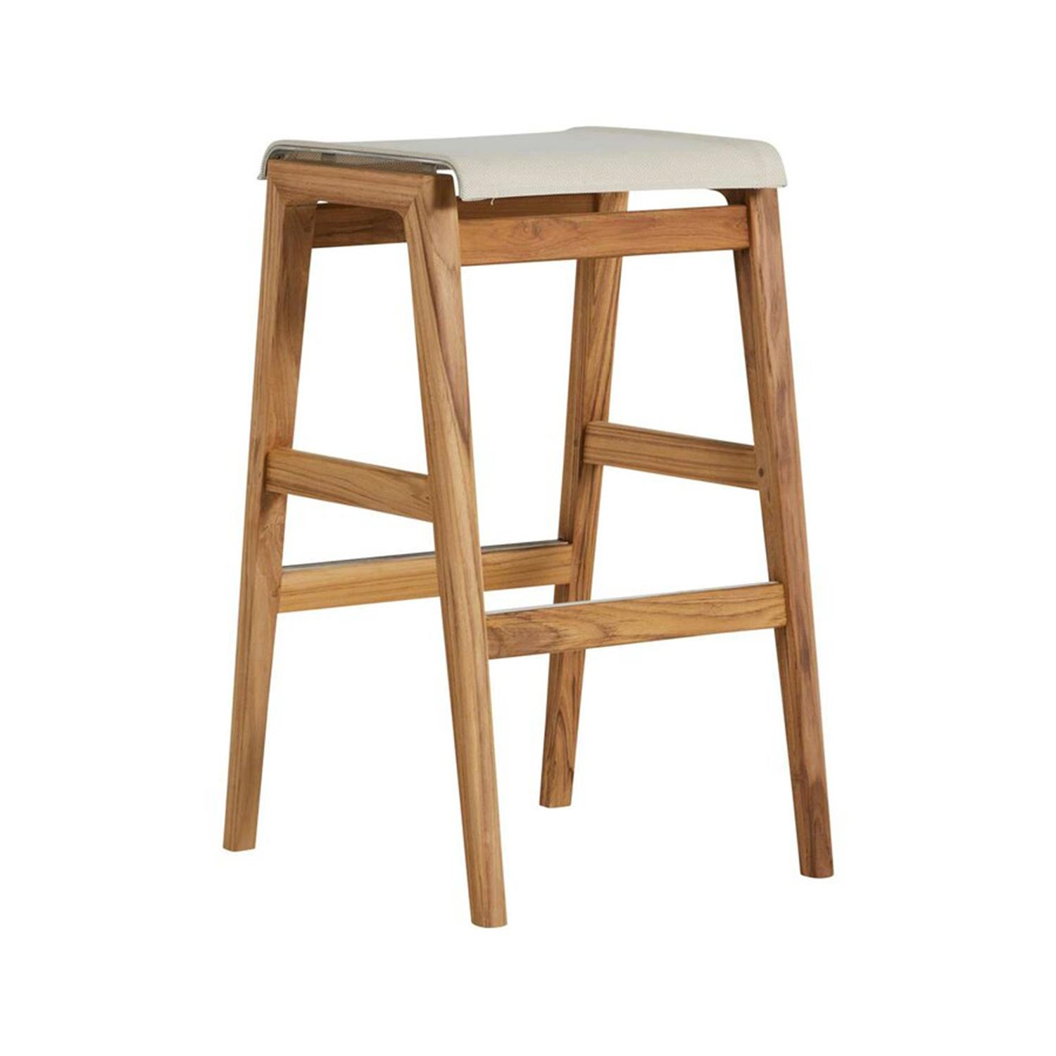 Backless teak bar stool with a natural canvas seat and subtle steel trim, A-frame teak legs and integrated footrest for coastal modern outdoor seating.