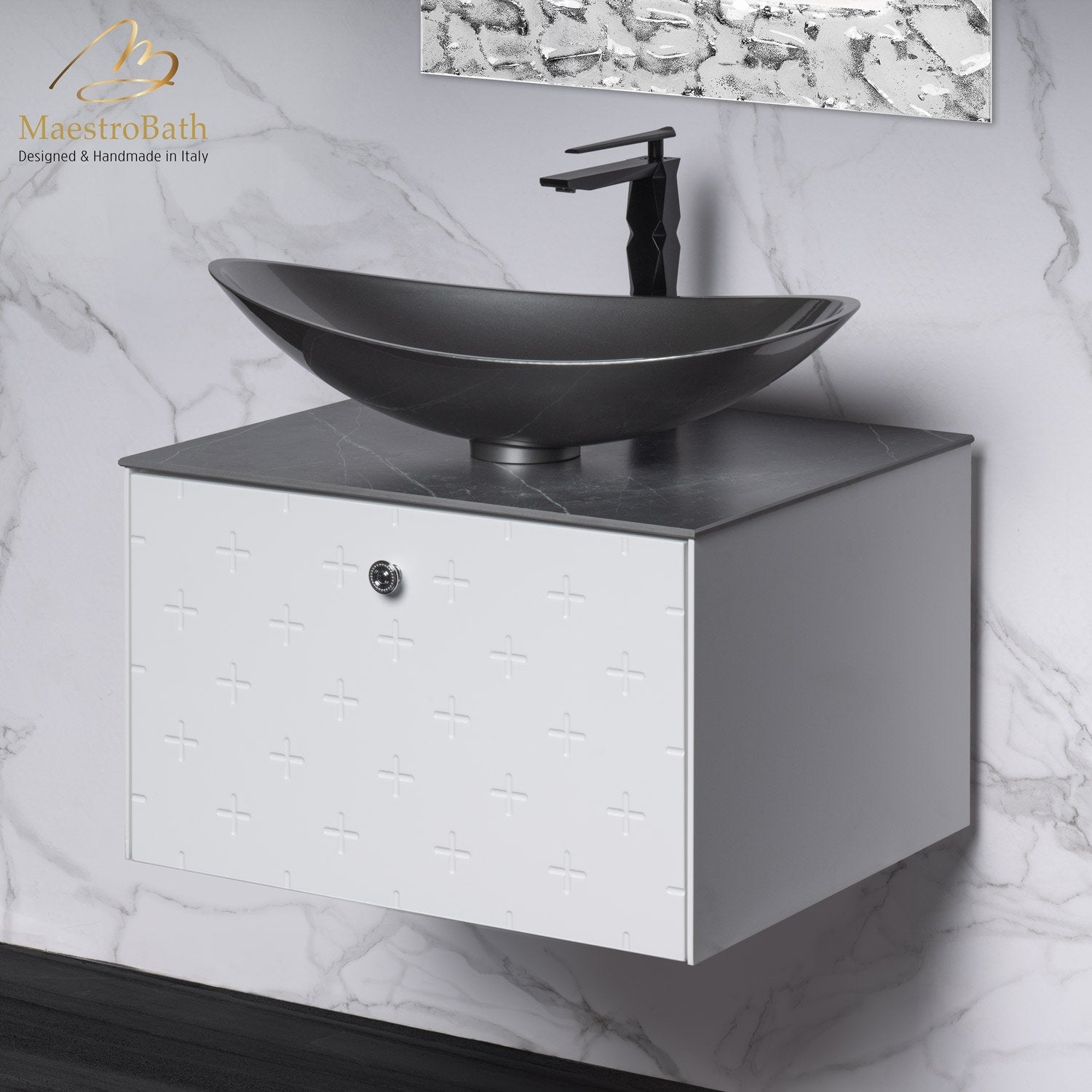 Modern solid wood floating bathroom vanity with a white embossed drawer front, dark stone-look countertop and matte black vessel sink with matching black faucet, shown mounted against a marble-look wall.