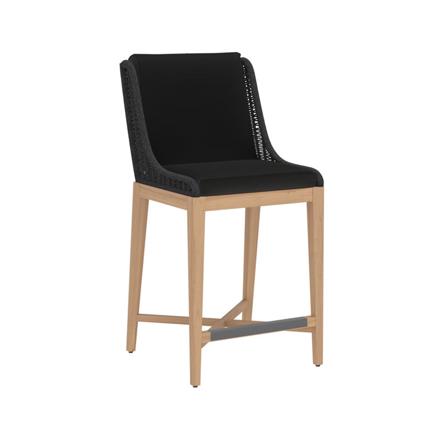 Armless teak outdoor bar stool with light teak wood frame, black cushioned upholstered seat and back, dark woven rope side detailing and a gray metal footrest.