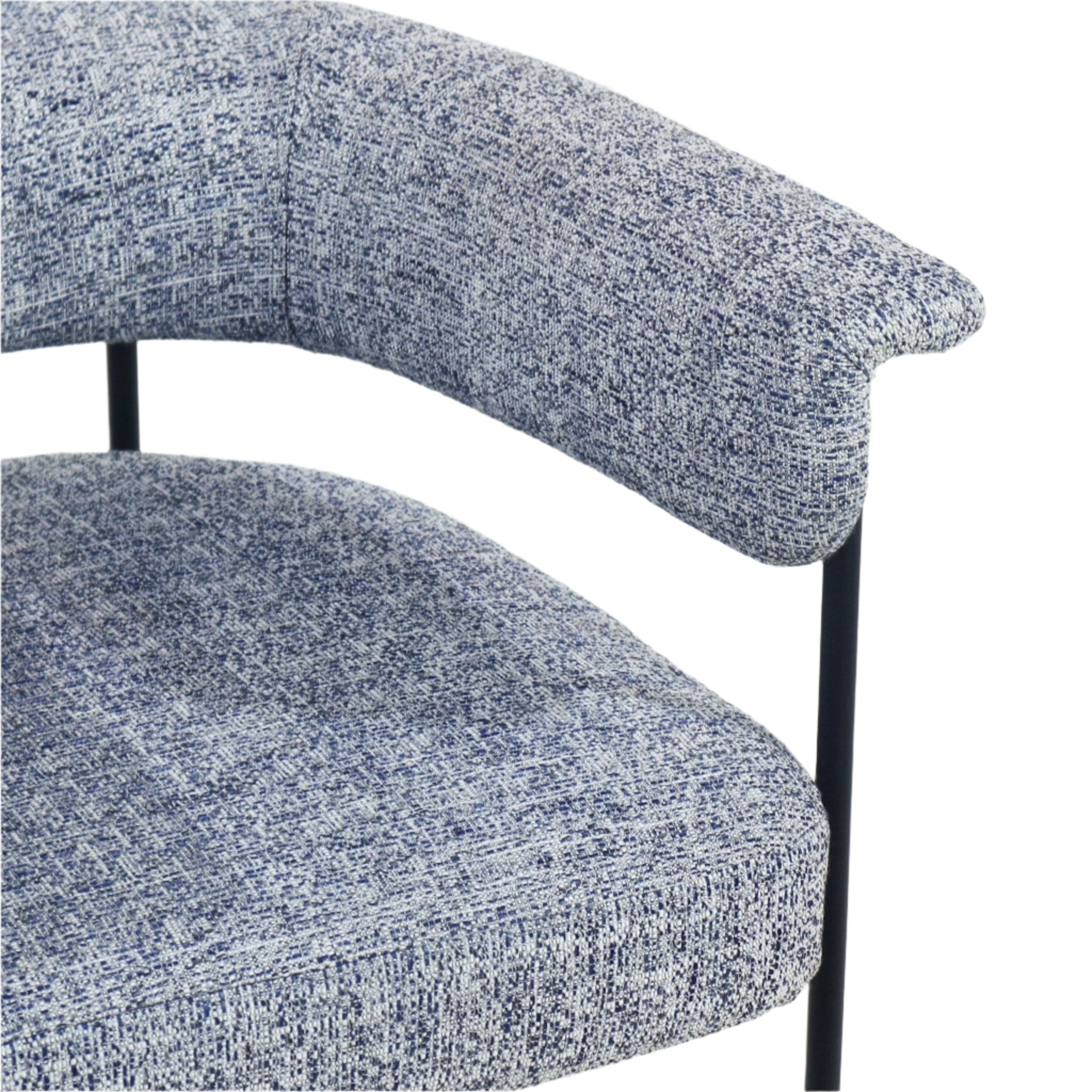 Close-up of a modern dining chair showing a gray boucle upholstered seat and curved low back with cushioned armrest, textured fabric visible and supported by a slim black metal leg.