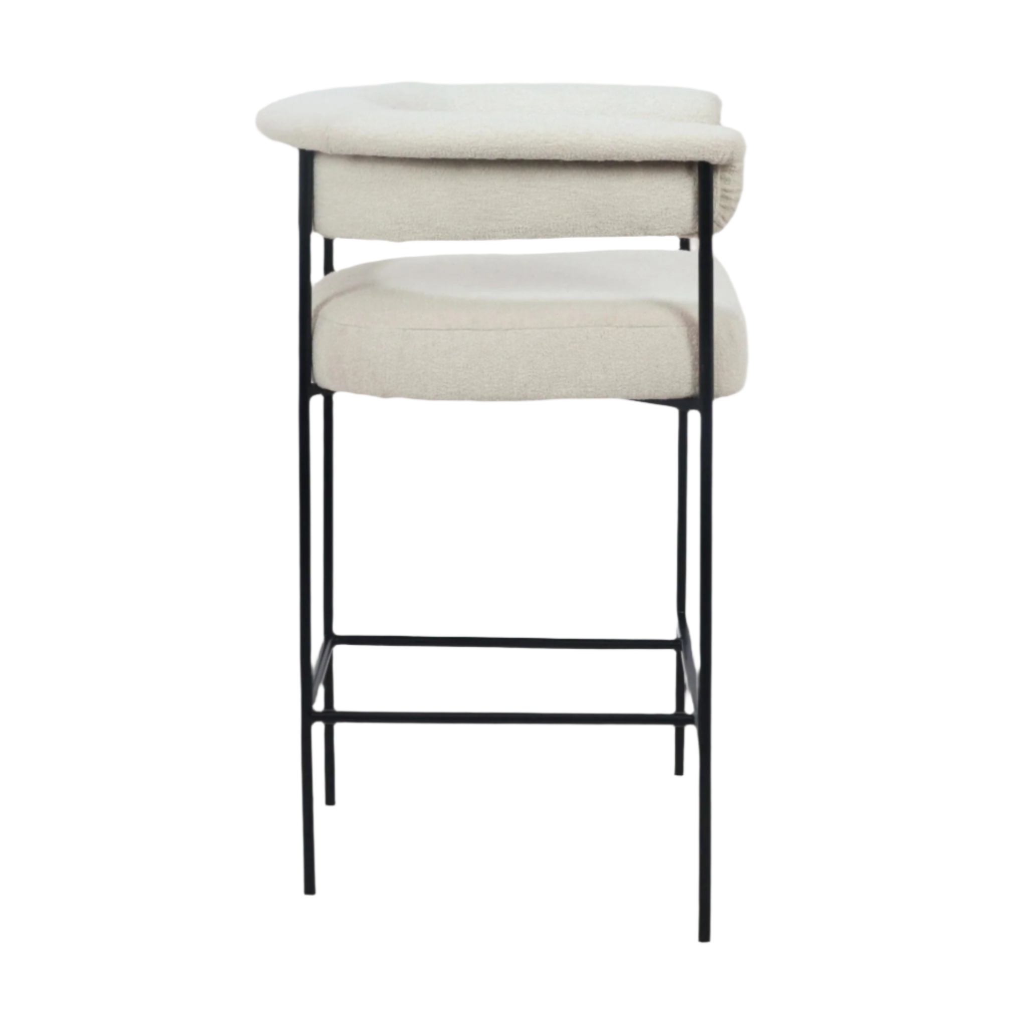 Cream boucle upholstered counter stool with a low rounded back and padded seat, supported by a slim matte black metal frame with integrated footrest, shown on a white background in a modern minimalist style.