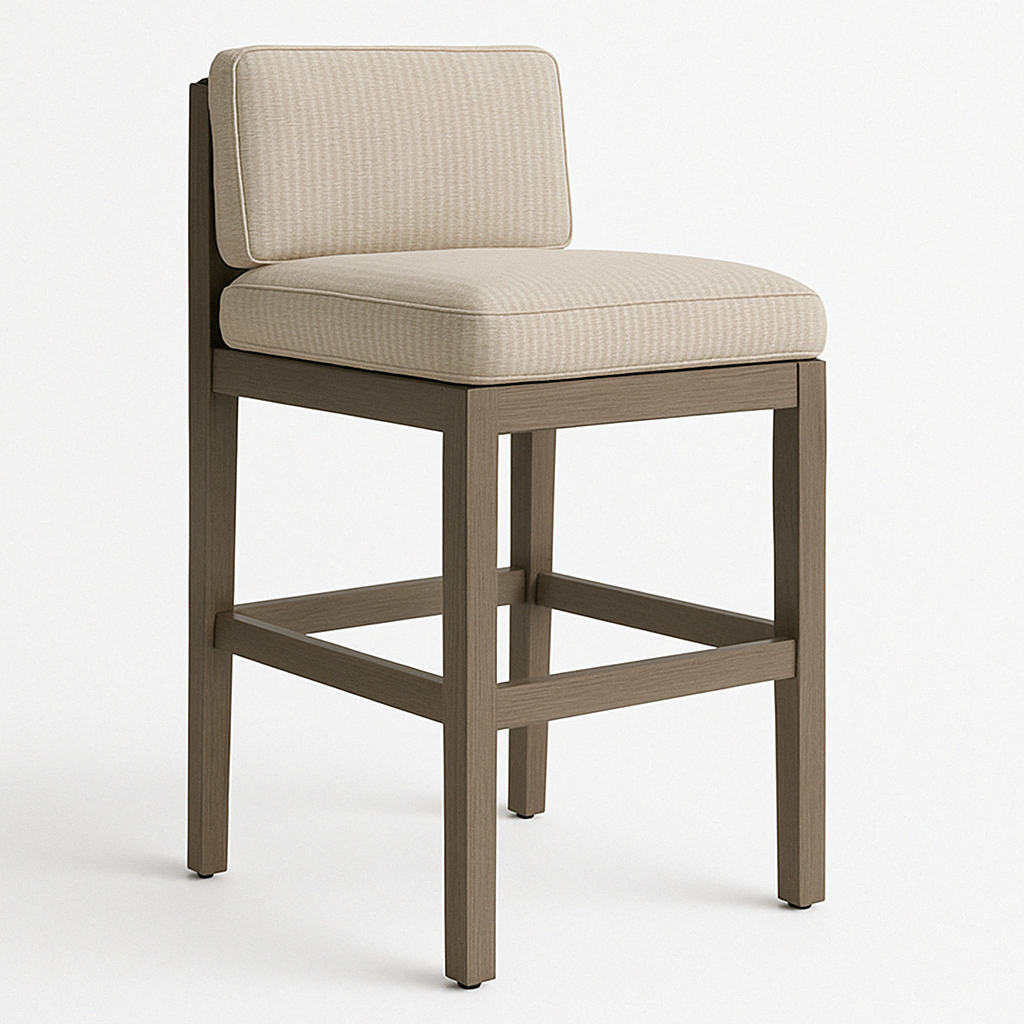 Armless teak bar stool with a beige upholstered seat and back cushion, square teak frame and integrated footrest in a clean contemporary coastal style for outdoor or kitchen island seating.