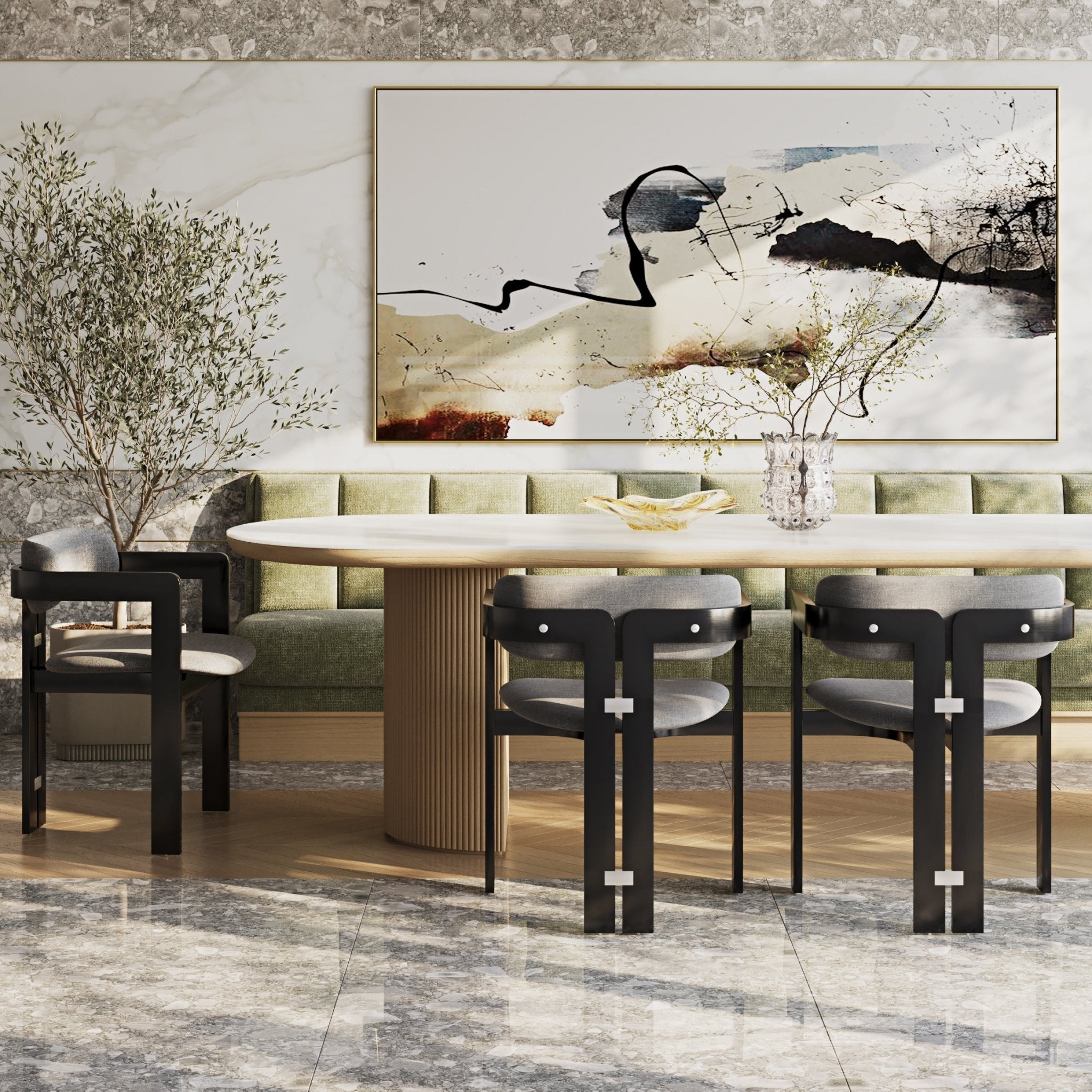 Black metal-framed dining chairs with grey boucle upholstered seats and curved backs arranged around a natural wood oval table in a modern dining room with a green banquette, marble tile floor and abstract wall art.