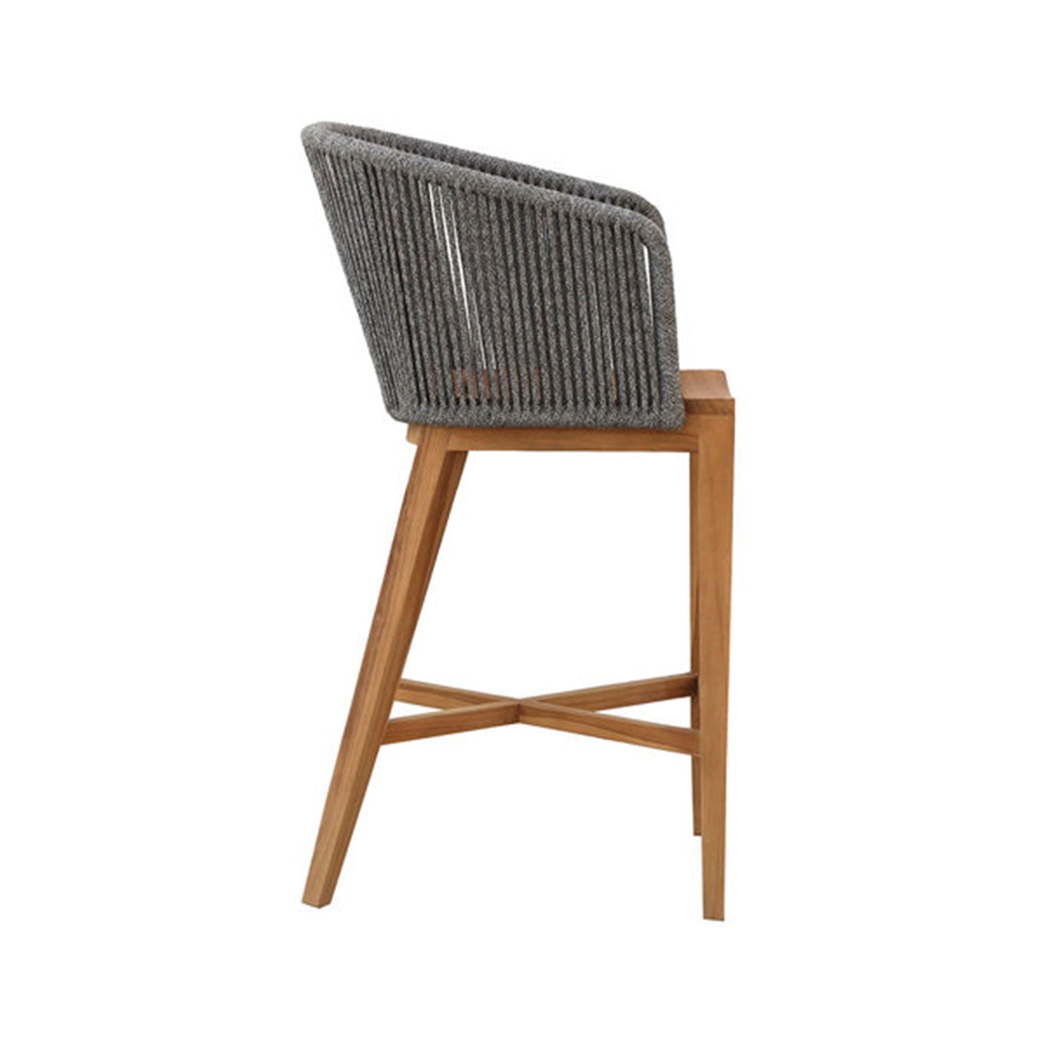 Side view of a teak outdoor bar stool with a natural teak wood frame, angled legs and X-shaped stretcher, and a grey rope-wrapped curved back with a matching cushioned seat.