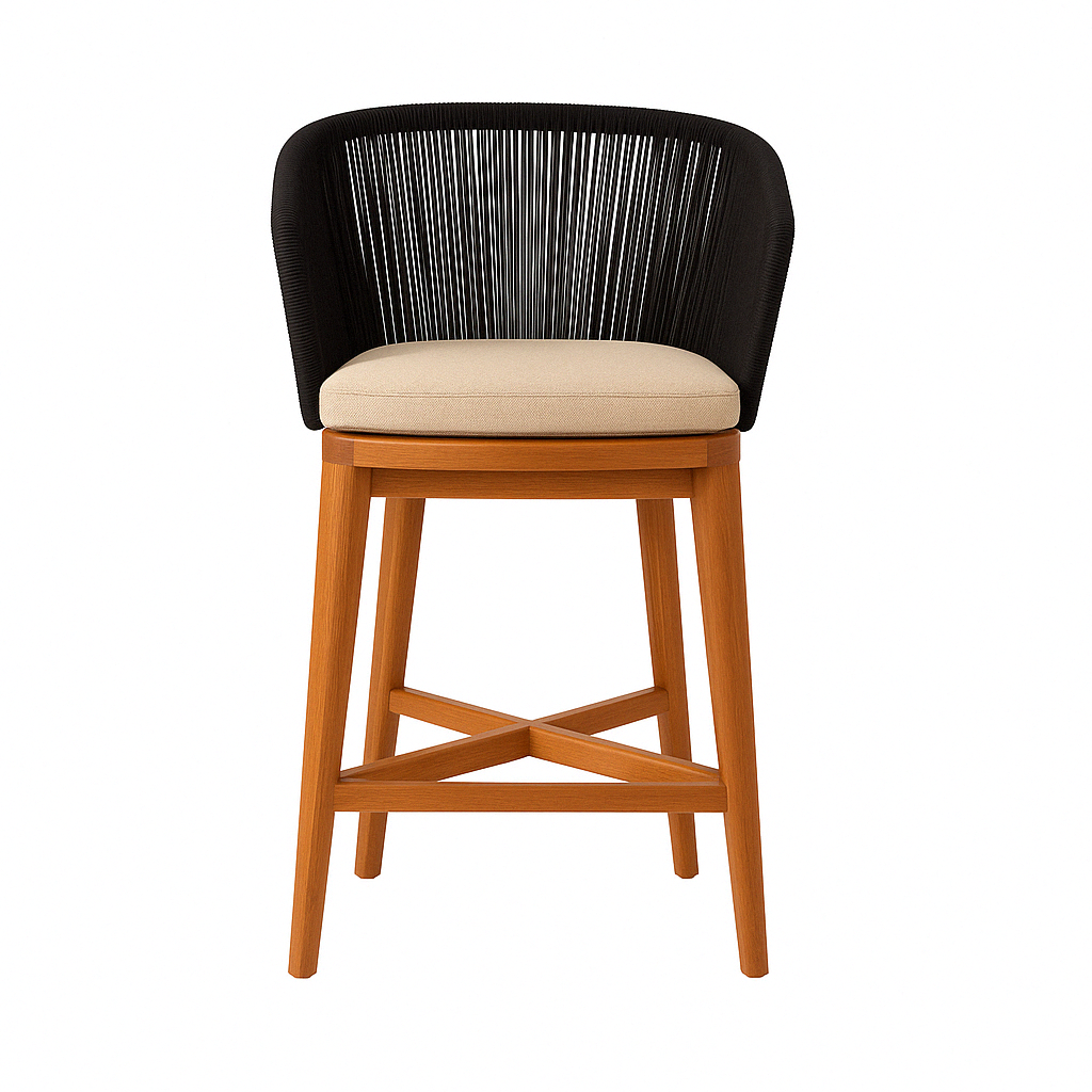 Counter-height teak bar stool with natural teak wood frame, beige fabric seat cushion and curved black woven rope back, angled legs with X-shaped stretcher in a contemporary coastal style.