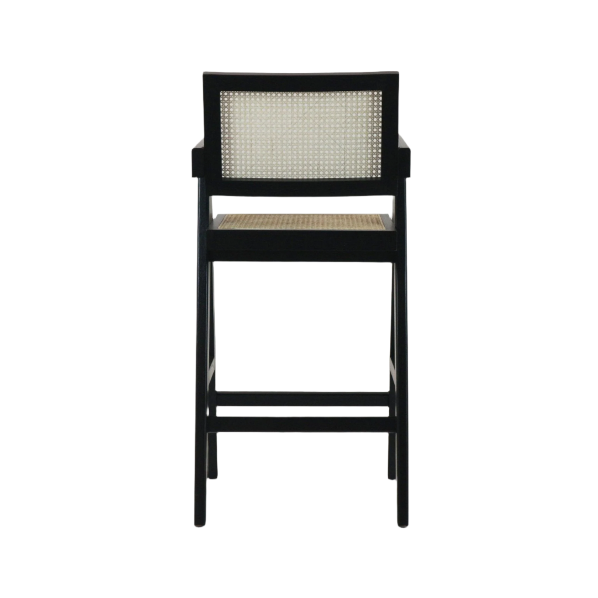 Front view of a black wooden bar stool with a natural rattan cane seat and rectangular cane backrest, straight legs and horizontal footrest in a mid-century modern style on a white background.