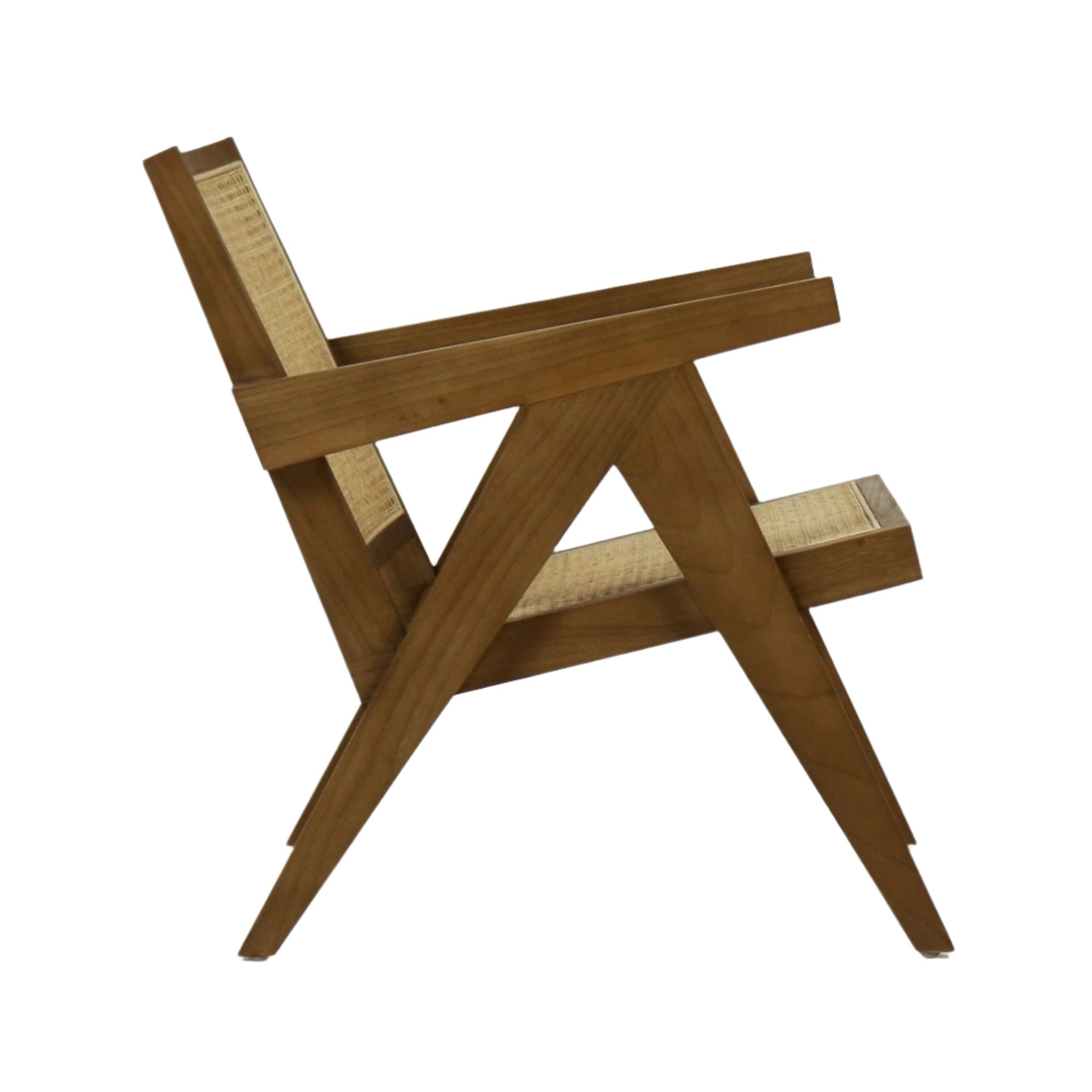 Side view of a mid-century modern lounge chair with a natural wood frame, angled A-shaped legs and low armrests, featuring woven rattan cane seat and back in a warm natural finish.