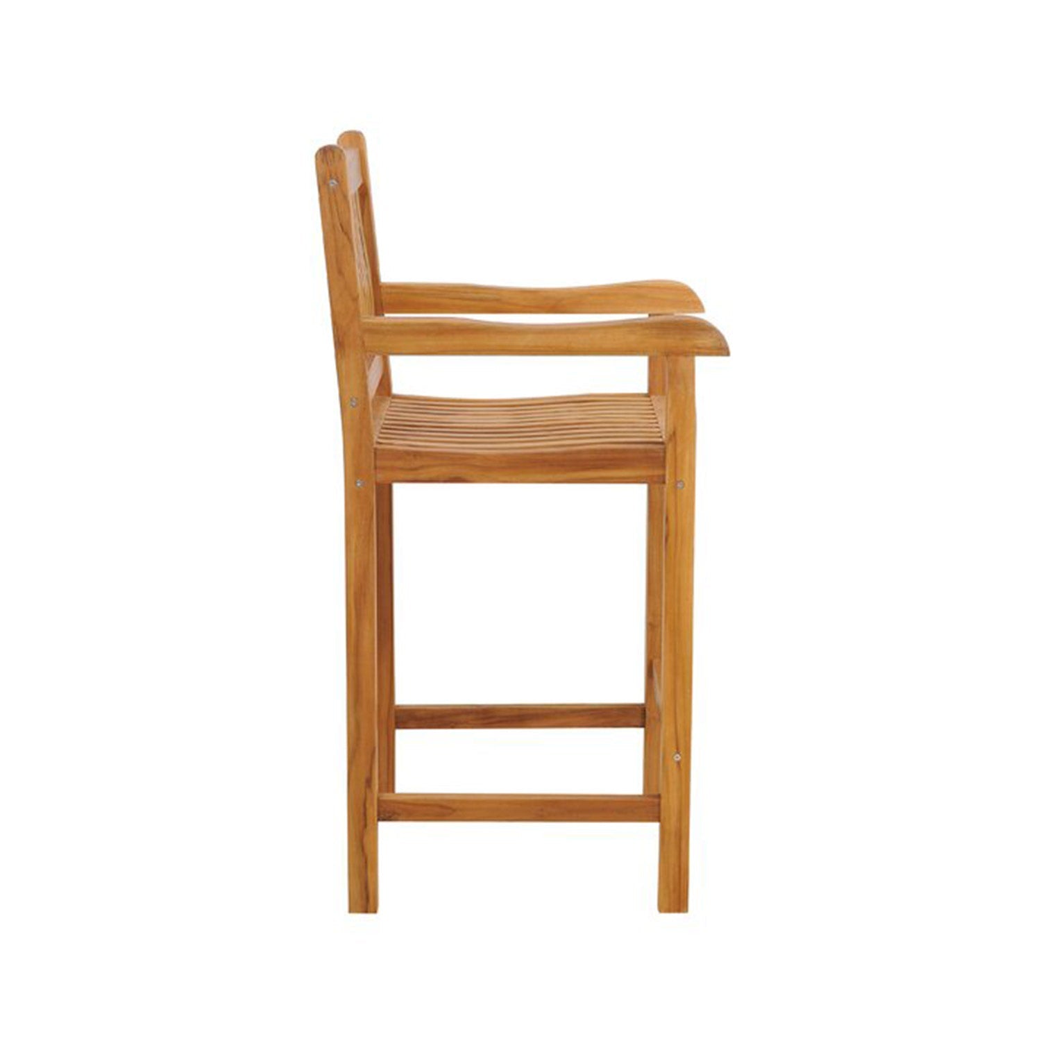 Side view of a natural teak outdoor bar stool with a slatted seat, low slatted back, curved armrests and rectangular legs with a built-in footrest on a white background.