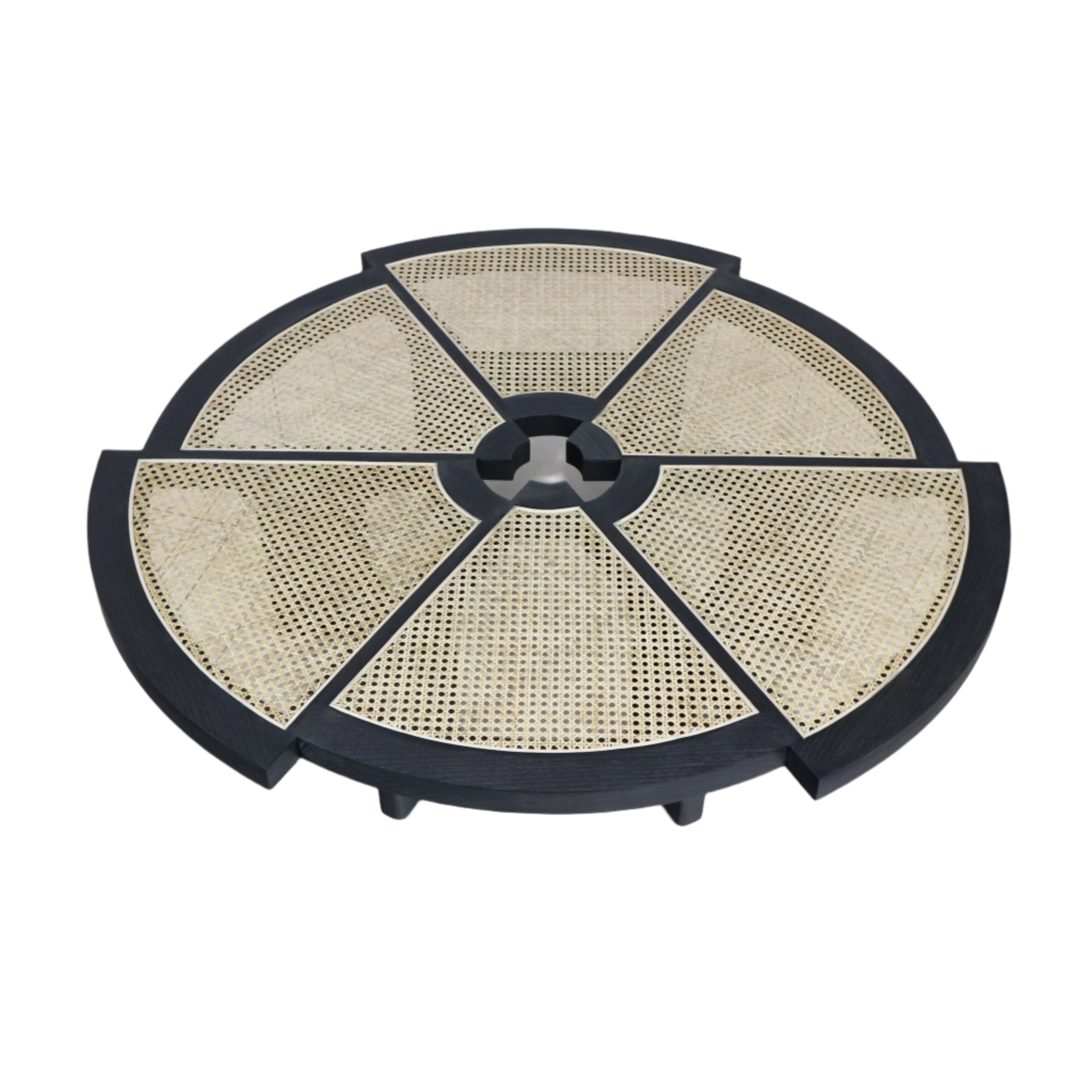 Top view of a round coffee table with a black solid wood frame and natural cane inlay arranged in six wedge panels around a central circular opening, showcasing modern minimalist styling.