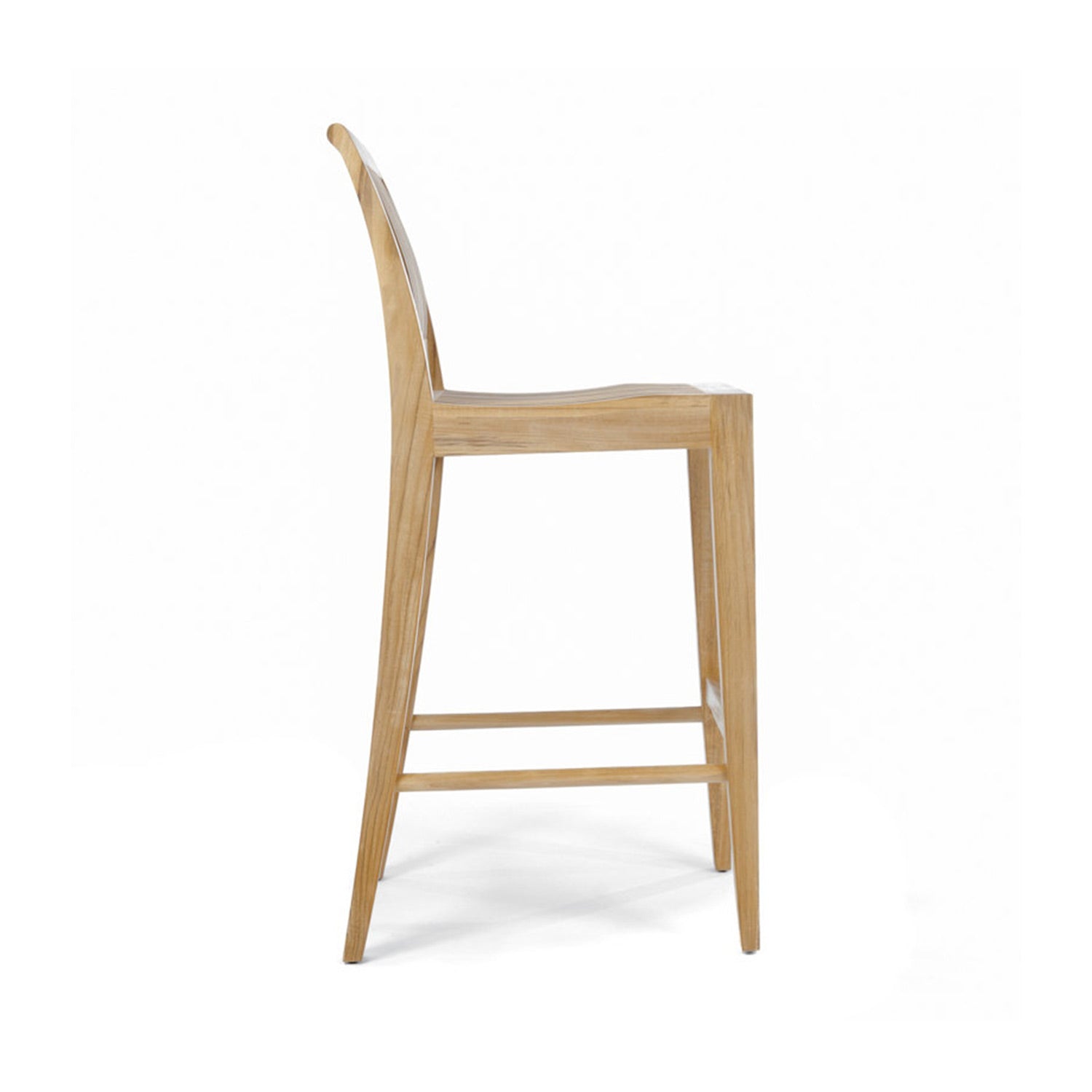 Side view of a coastal-style armless bar stool in natural teak with a low-profile upholstered seat, tapered legs and integrated footrest, photographed on a white background.