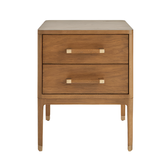Front-facing warm brown solid wood nightstand with two drawers, brass bar handles and brass-capped tapered legs, a contemporary glam design shown on a white background.