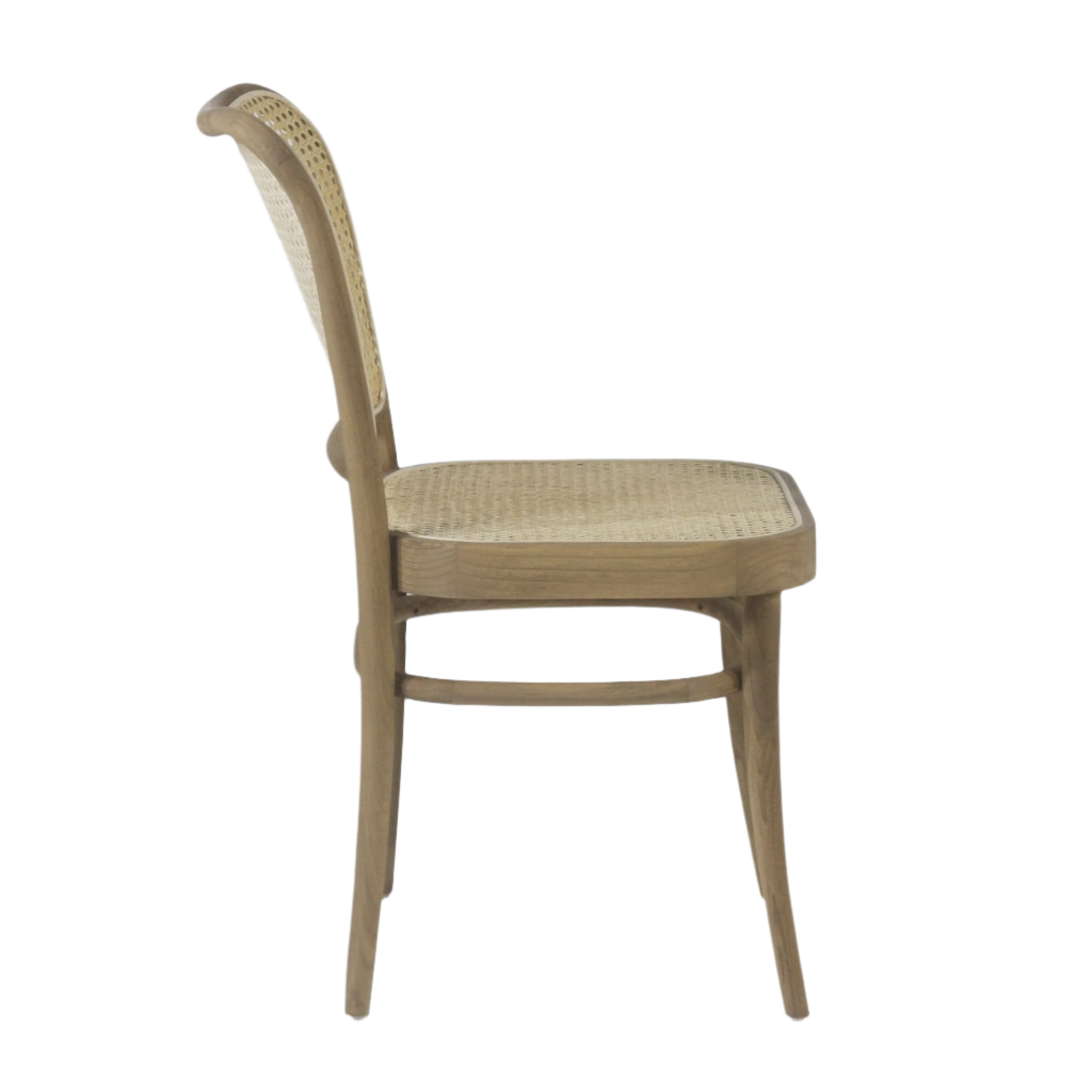 Side view of an oak dining chair with a woven cane seat and cane-back panel, armless solid wood frame with tapered legs and a natural oak finish in a coastal style.