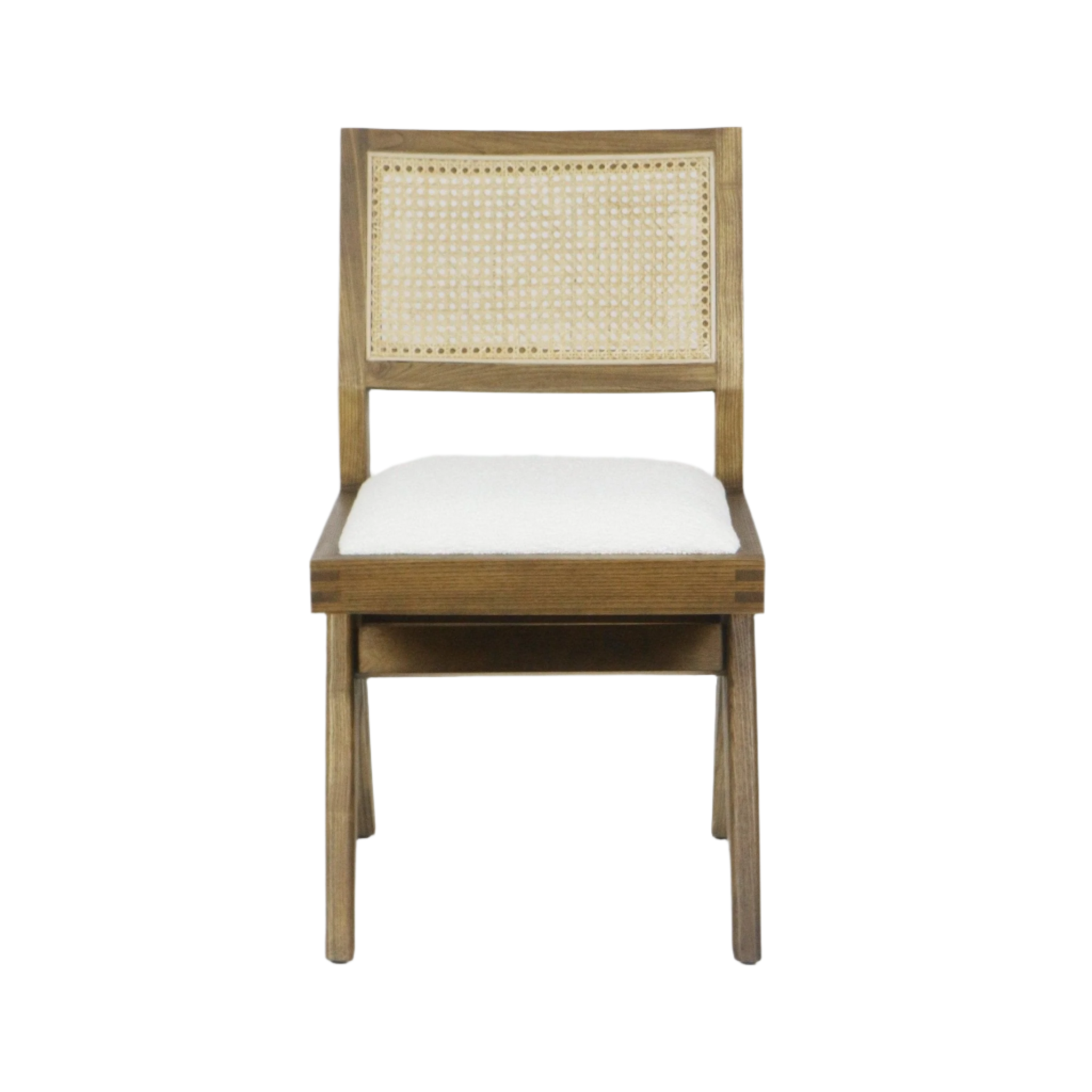 Front view of an armless side chair with a natural wood frame, woven cane backrest and a white boucle upholstered seat.