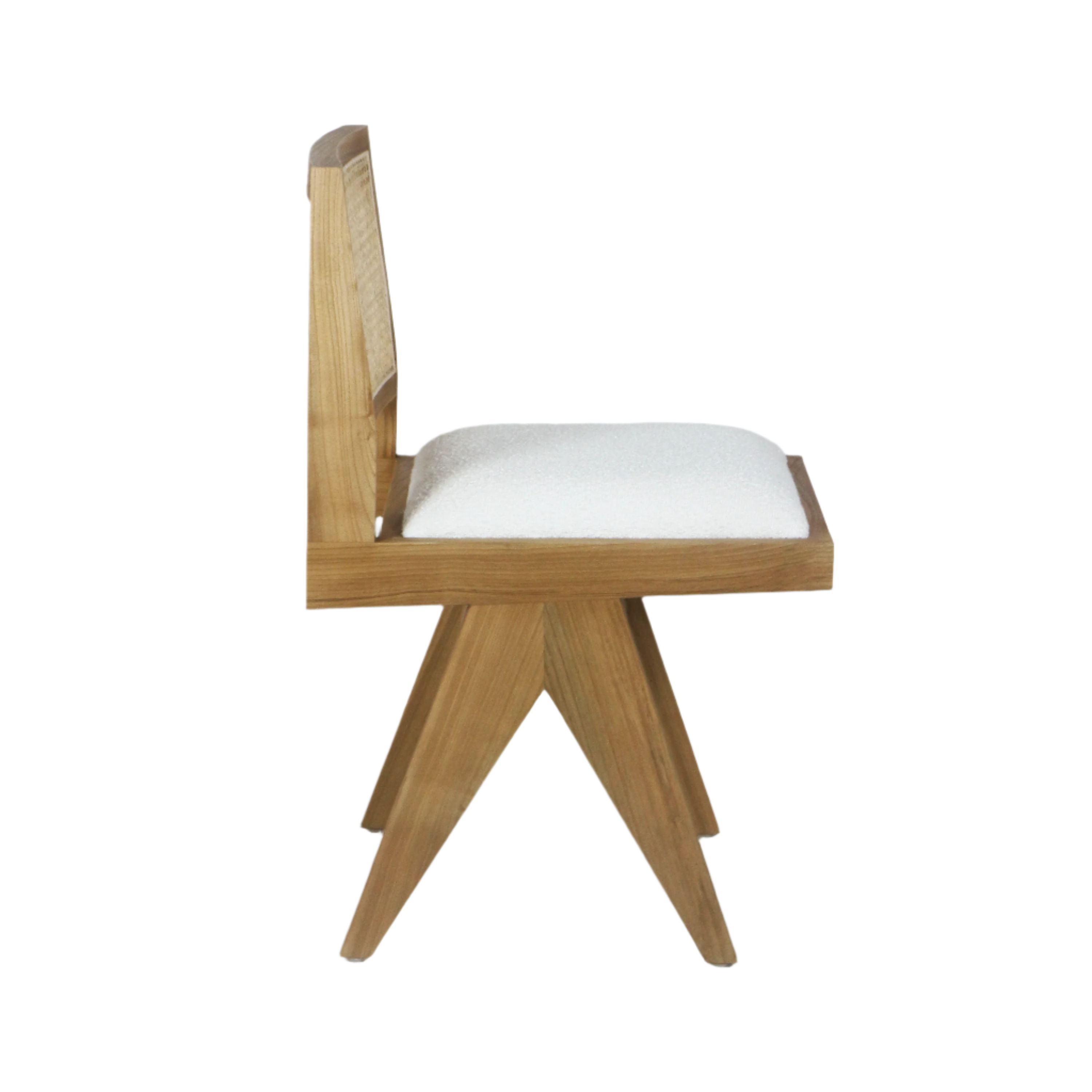 Side profile of an armless dining chair in natural ash wood with a cream boucle upholstered seat, sculpted low back and angular mid-century modern legs.