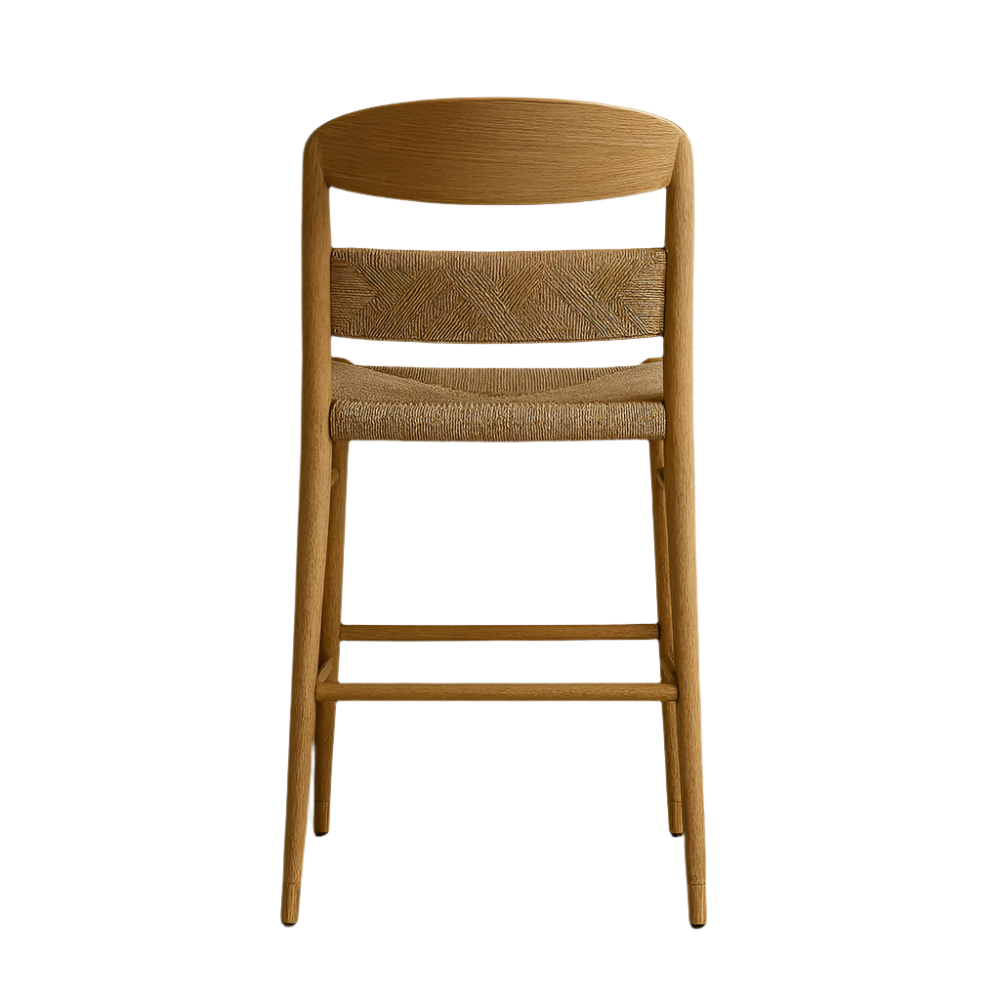 Front view of a mid-century modern natural wood bar stool with a curved wooden backrest, woven papercord seat and back panel, tapered legs and a built-in footrest in a neutral natural finish.