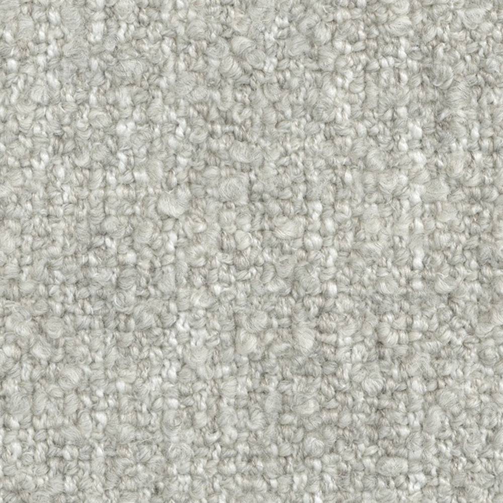 Close-up of light neutral boucle upholstery fabric showing dense looped texture; 24% wool, 66% acrylic, 10% polyester blend designed for contemporary sofa upholstery.