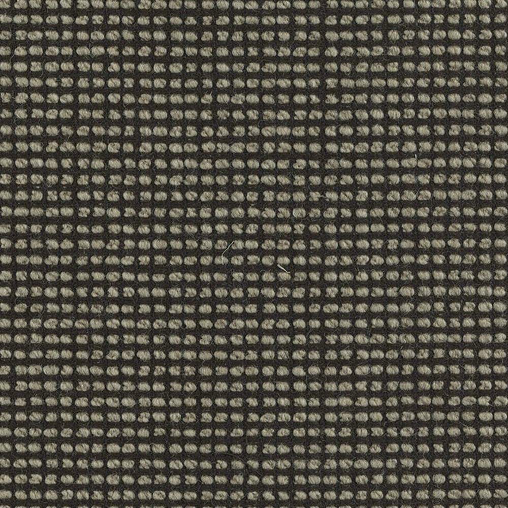 Close-up of a linen-wool blend upholstery fabric showing a small beige looped grid on a dark charcoal ground, highlighting textured yarn and a tight weave suitable for sofa upholstery.