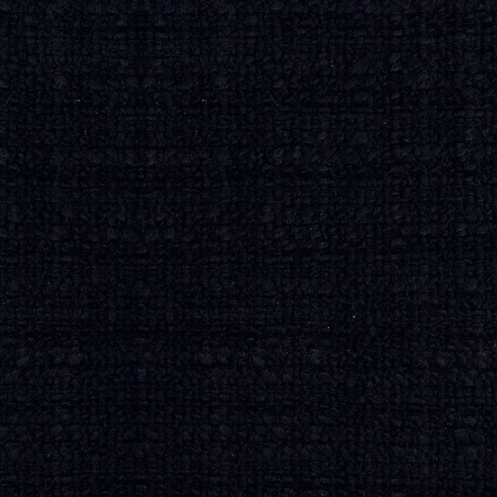 Close-up of deep charcoal black textured upholstery fabric for sofas, boucle-like looped weave in 32% wool, 48% acrylic and 20% triacetate.
