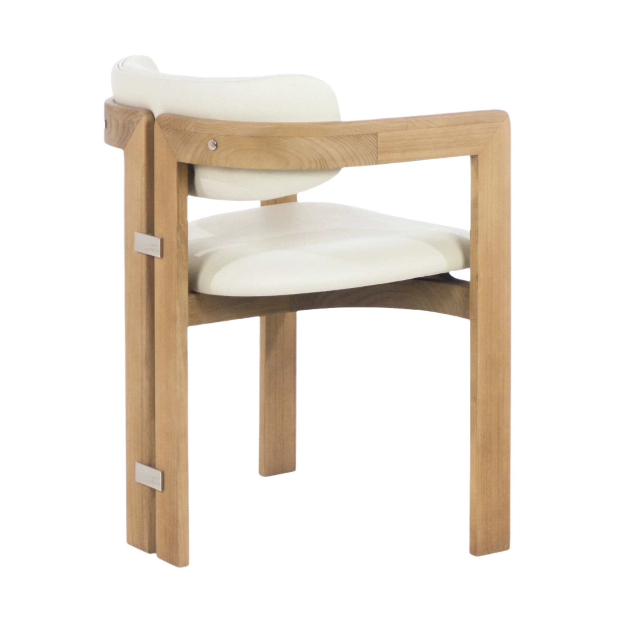 Three-quarter rear view of a teak-framed dining chair with beige leather-upholstered seat and curved backrest, featuring metal accent plates on the rear legs.